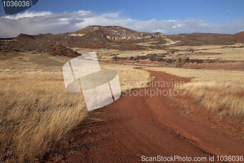 Image of windy ranch road in mountain valley