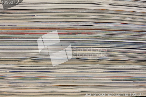 Image of stack of colorful magazines - background