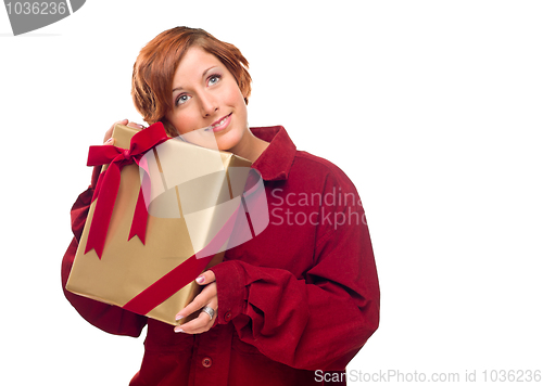 Image of Pretty Red Haired Girl with Wrapped Gift Isolated
