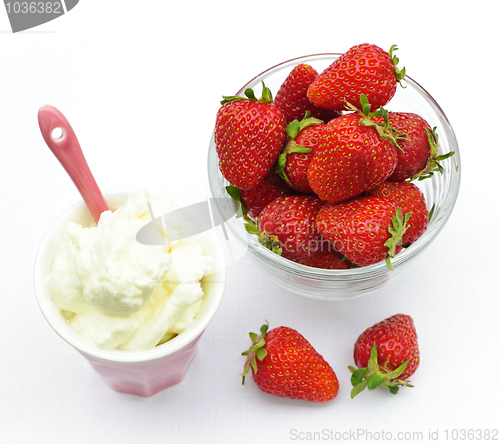 Image of Bowl of strawberries with whipped cream