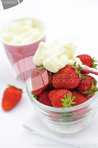 Image of Bowl of strawberries with whipped cream