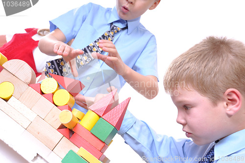 Image of school boys playing with blocks