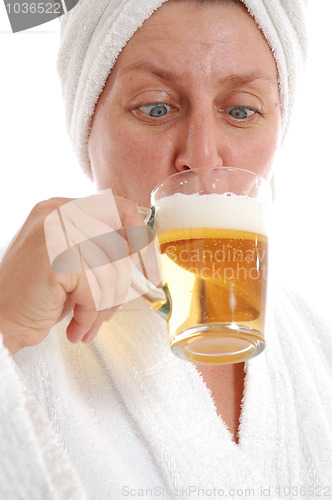 Image of woman drinking beer