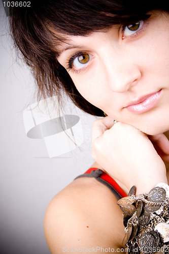 Image of brunette lady with bracelets