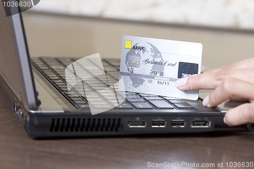 Image of woman hands holding credit card, online shopping concep