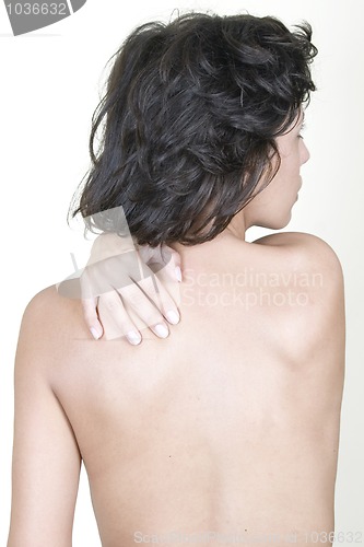 Image of Woman massaging upper back pain