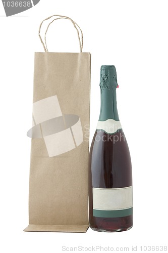 Image of champagne bottle and brown bag
