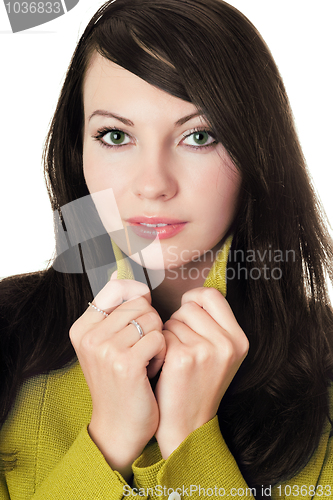 Image of Pretty woman in yellow knitted jacket