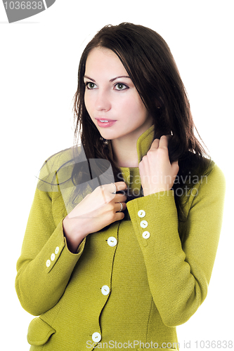 Image of Pretty woman in yellow knitted jacket