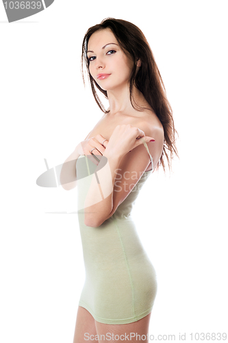 Image of Playful woman in olive dress