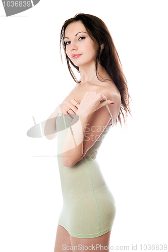 Image of Playful woman in olive dress