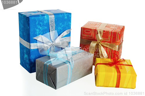 Image of Multi-coloured boxes with gifts, it is isolated on white