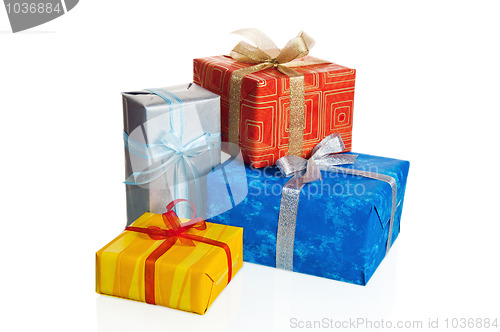 Image of Multi-coloured boxes with gifts, it is isolated on white