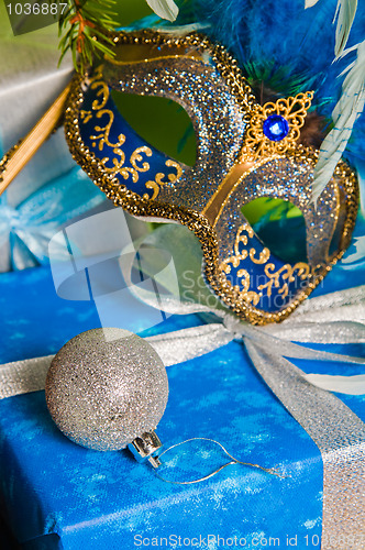 Image of  New Year's and Christmas ornaments and a carnival a mask