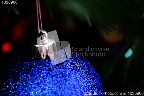 Image of Christmas ornaments on tree.