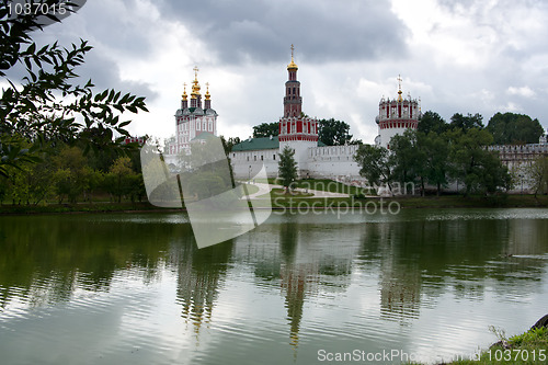 Image of Novodevichy Convent reflects in the lake.