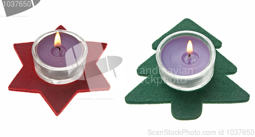 Image of Red star and green pine tree  Christmas decorations with candles