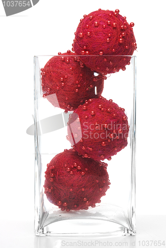 Image of Christmas decorative balls in glass jar