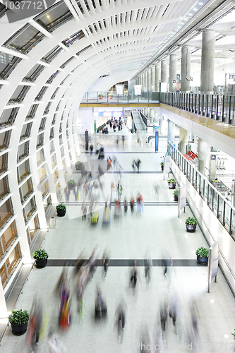 Image of people moving blur in corridor