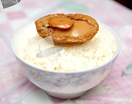 Image of home made cooked abalone on rice