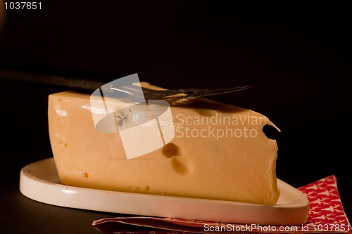 Image of cheese and slicer