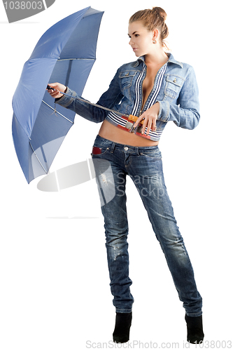 Image of Leggy young woman in a denim suit 