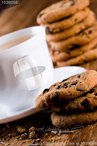 Image of cup of herbal tea and some fresh cookies