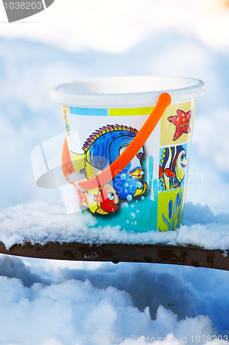 Image of Toy bucket on the snow