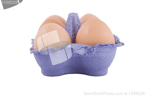 Image of brown hens eggs in blue egg carton
