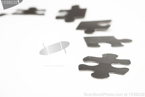 Image of different black puzzle
