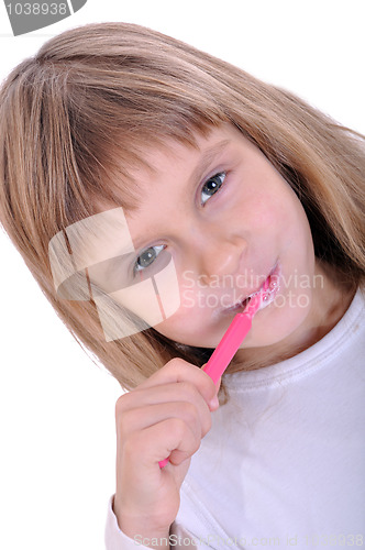 Image of child cleaning teeth