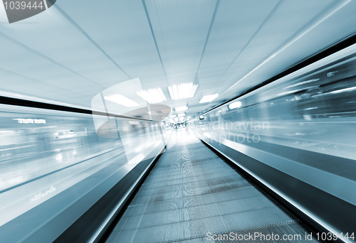 Image of moving escalator in business center