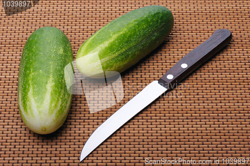 Image of Cucumbers and knife