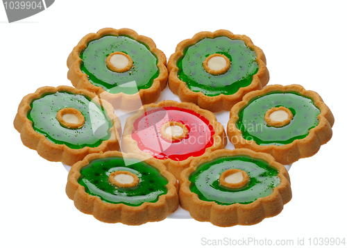 Image of Cookies with red and green jelly on white plate, isolated