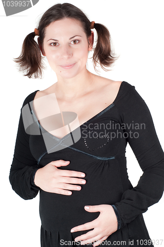 Image of Portrait of pretty pregnant woman in black dress