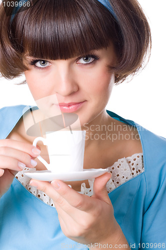 Image of woman enjoying a cup of coffee