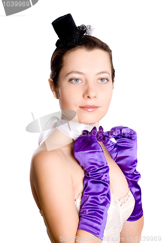 Image of woman in corset, gloves and little hat