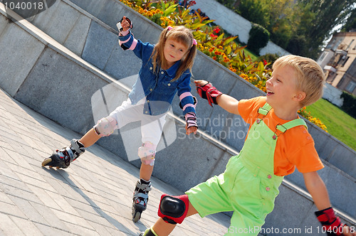 Image of Rollerblading children.