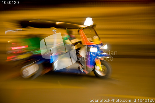 Image of Blurred tuk-tuk taxi in Bangkok, Thailand