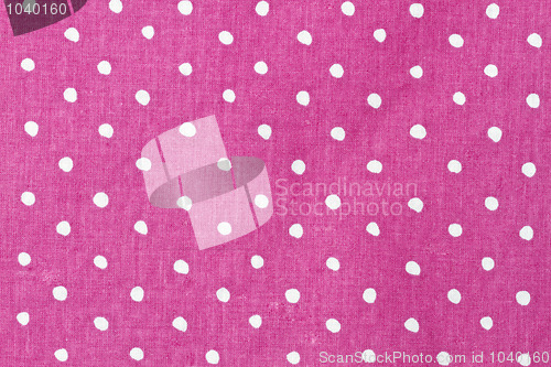 Image of Pink  and white dots fabric background 