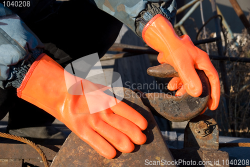 Image of orange gloves