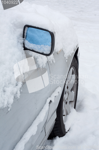 Image of Car covered in snow