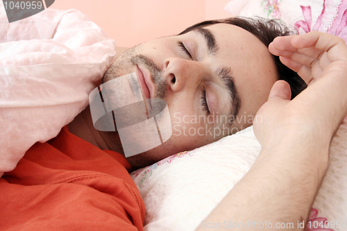 Image of Portrait of a young man sleeping.