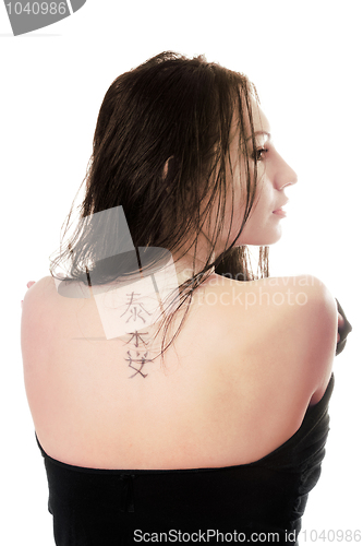 Image of Tattoo on young caucasian woman