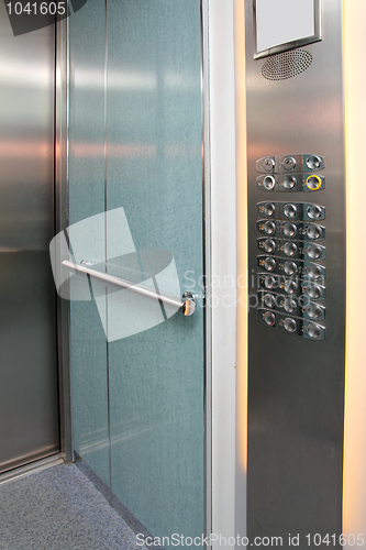 Image of elevator interior with control panel