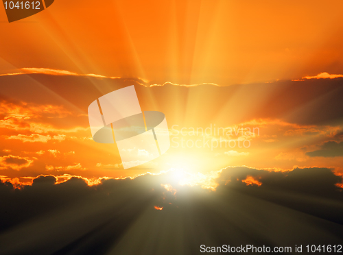 Image of orange sunset with sunbeams