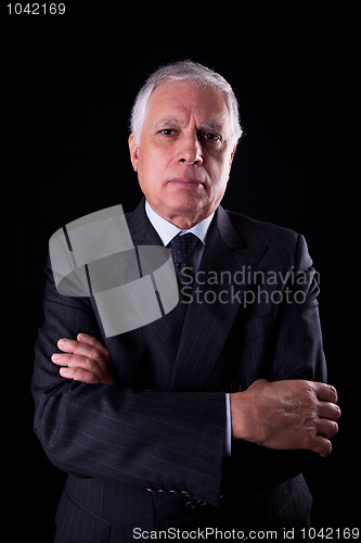 Image of Portrait of a handsome mature businessman, thinking