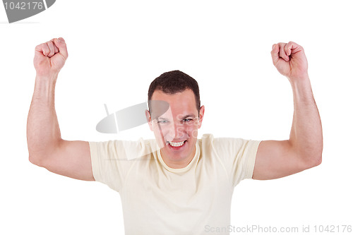 Image of Portrait of a happy  man with his arms raised