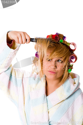 Image of housewife with hairbrush