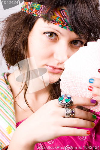 Image of soothsayer with scrying cards